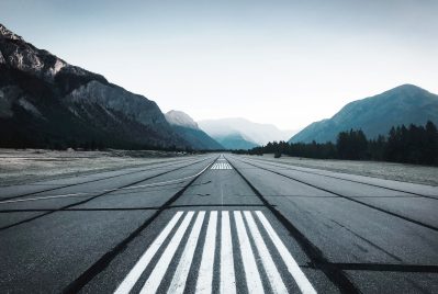 Empty runway at dusk. Photo: Jonathan Letniak, Unsplash