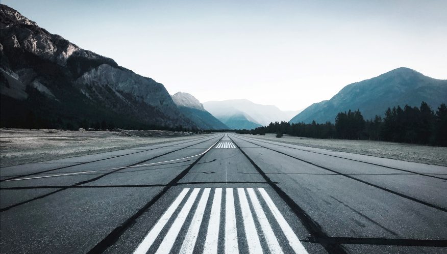 Empty runway at dusk. Photo: Jonathan Letniak, Unsplash